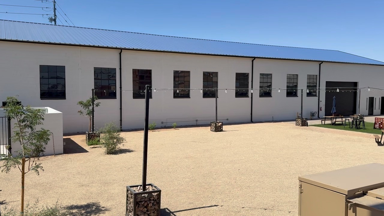 Terminal 318 warehouse exterior with industrial windows and open courtyard